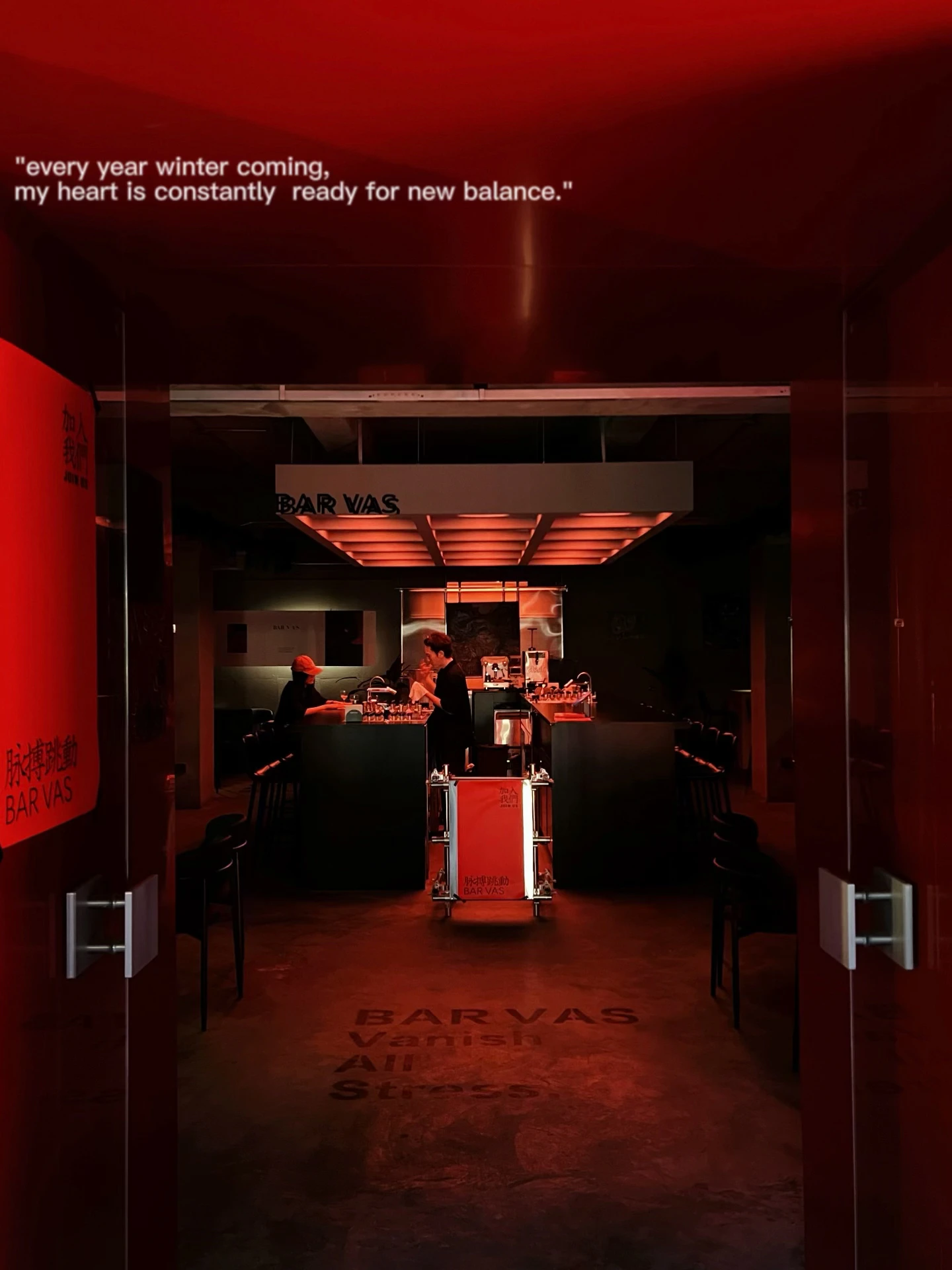 Red-lit entrance and cocktail counter with BAR VAS signage in Xian