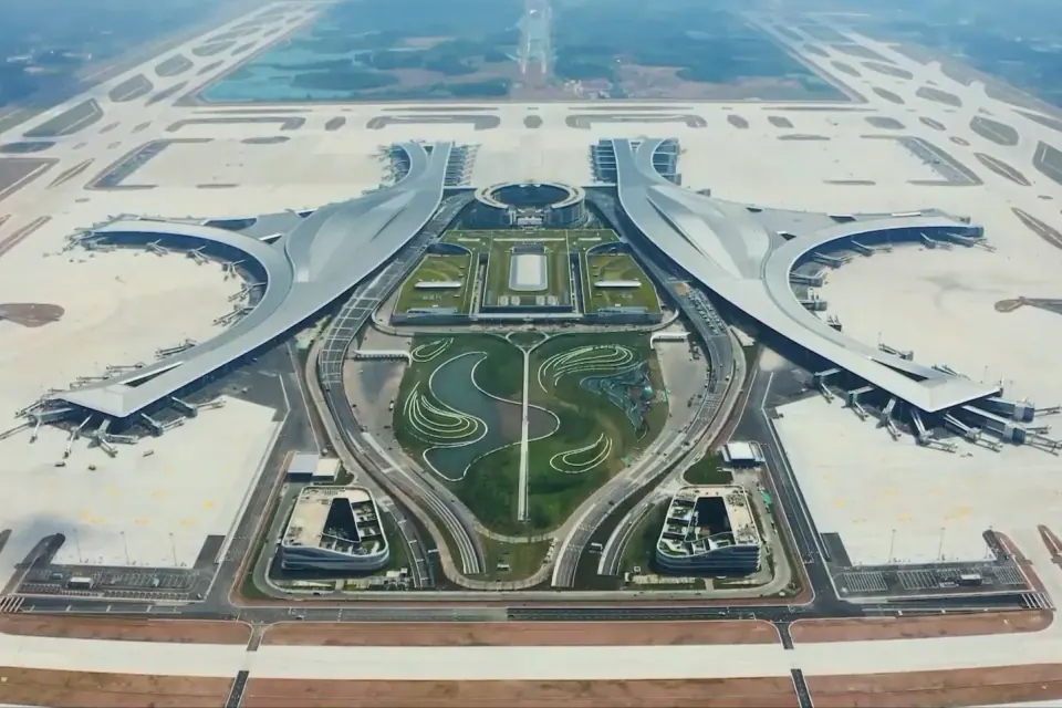 Curved terminal buildings and landscaped forecourt at Chengdu Tianfu International Airport