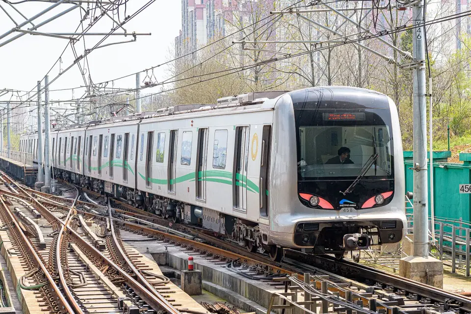 Chengdu Metro train reversing on surface tracks at Xihe Station