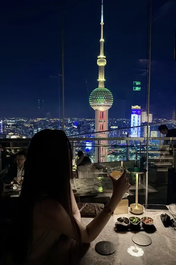 Cocktails on a table overlooking the Oriental Pearl Tower from Flair in Shanghai