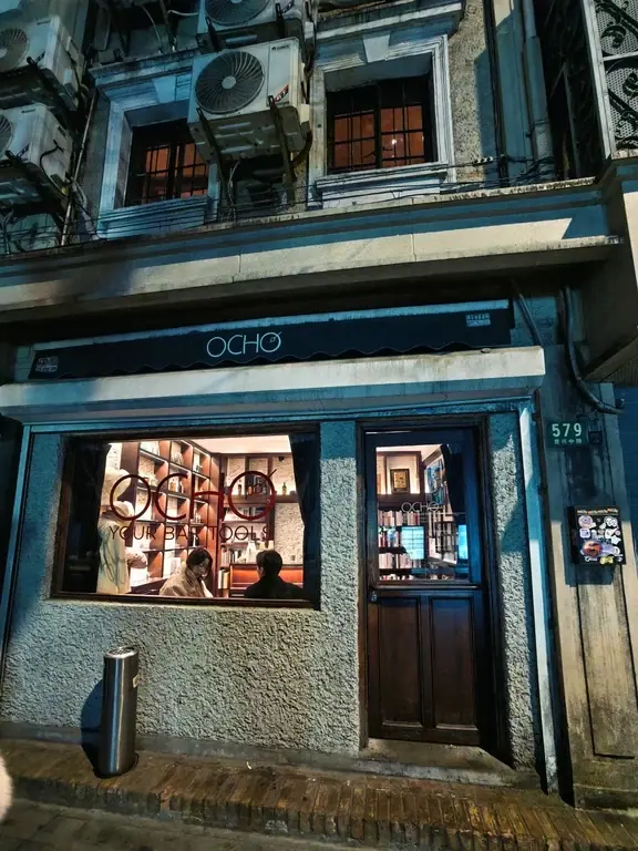 Street facade and open entrance associated with Speak Low in Shanghai