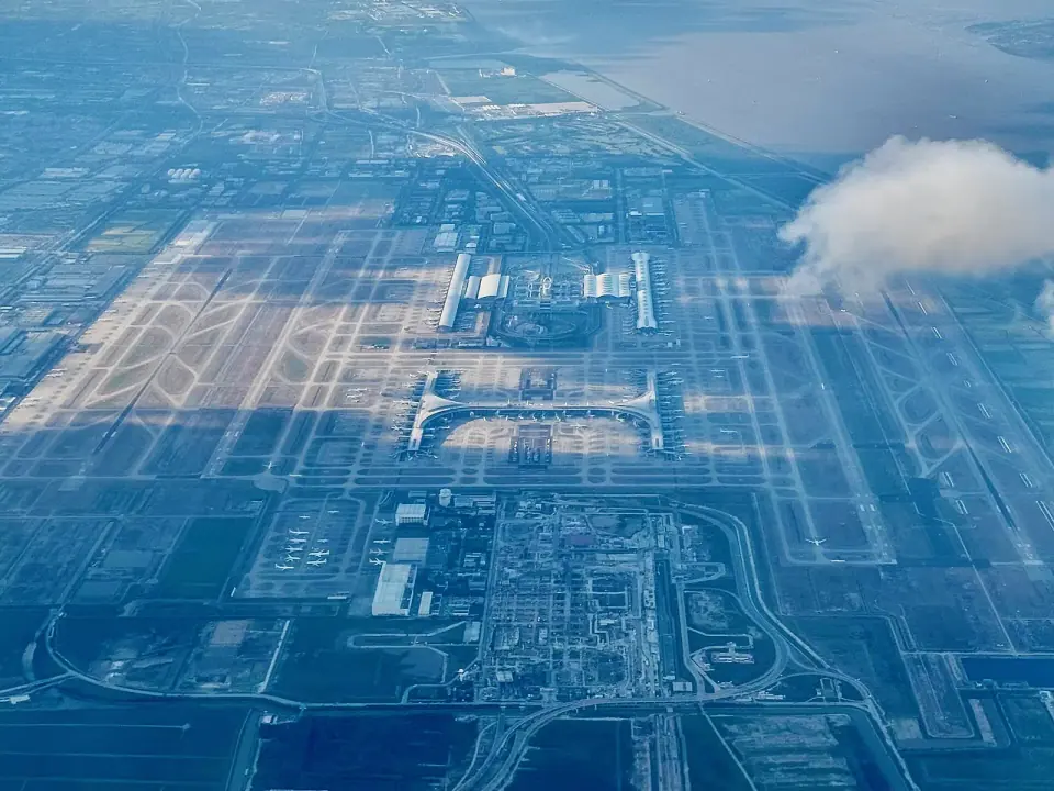 Aerial view of terminals and runways at Shanghai Pudong International Airport
