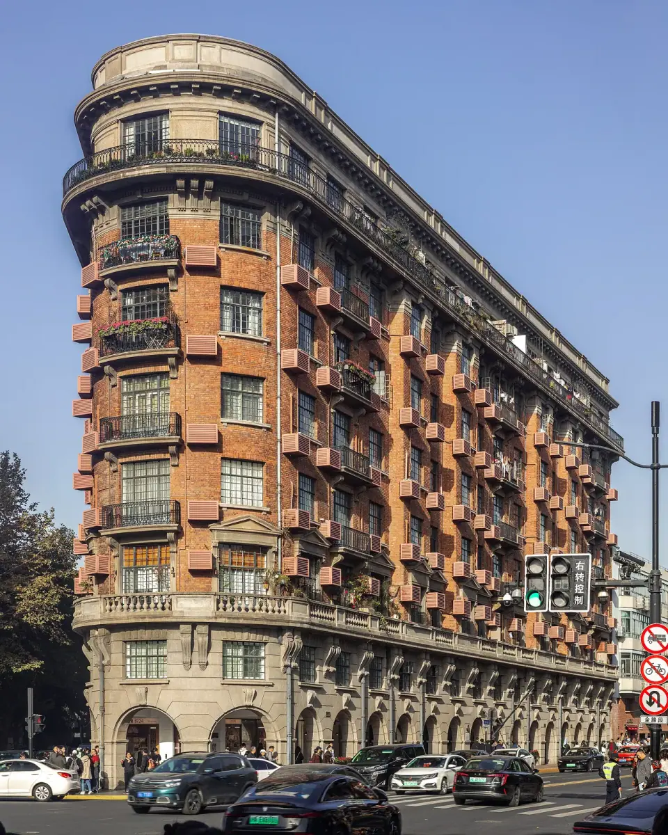 The wedge-shaped Wukang Mansion with red-brick balconies in Shanghai
