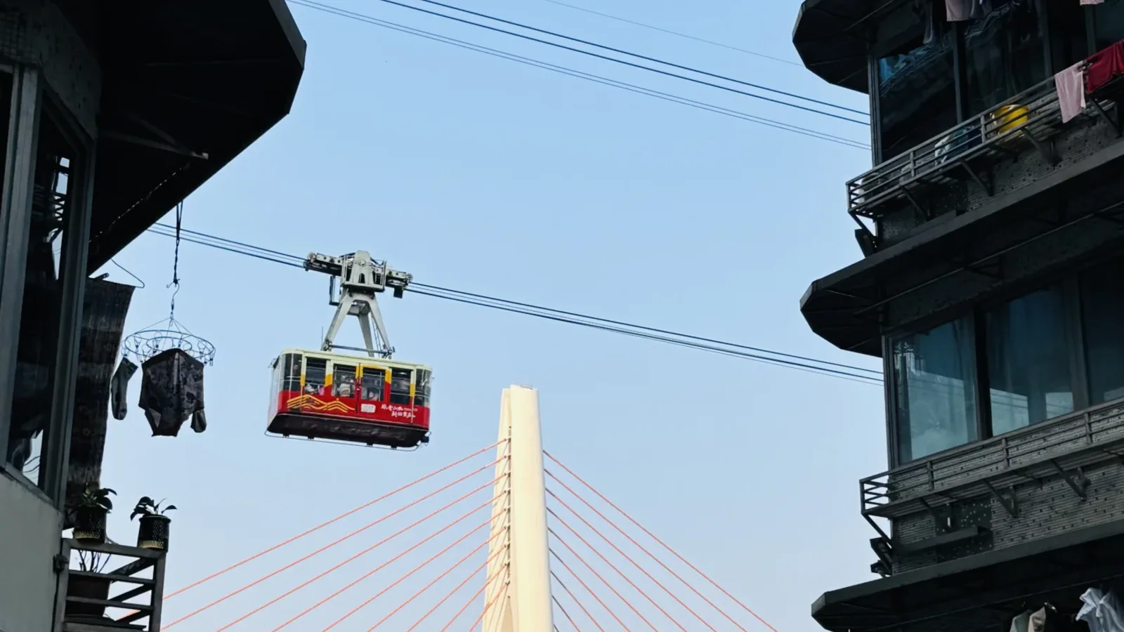 Yangtze River Cableway crossing Chongqing's riverfront skyline