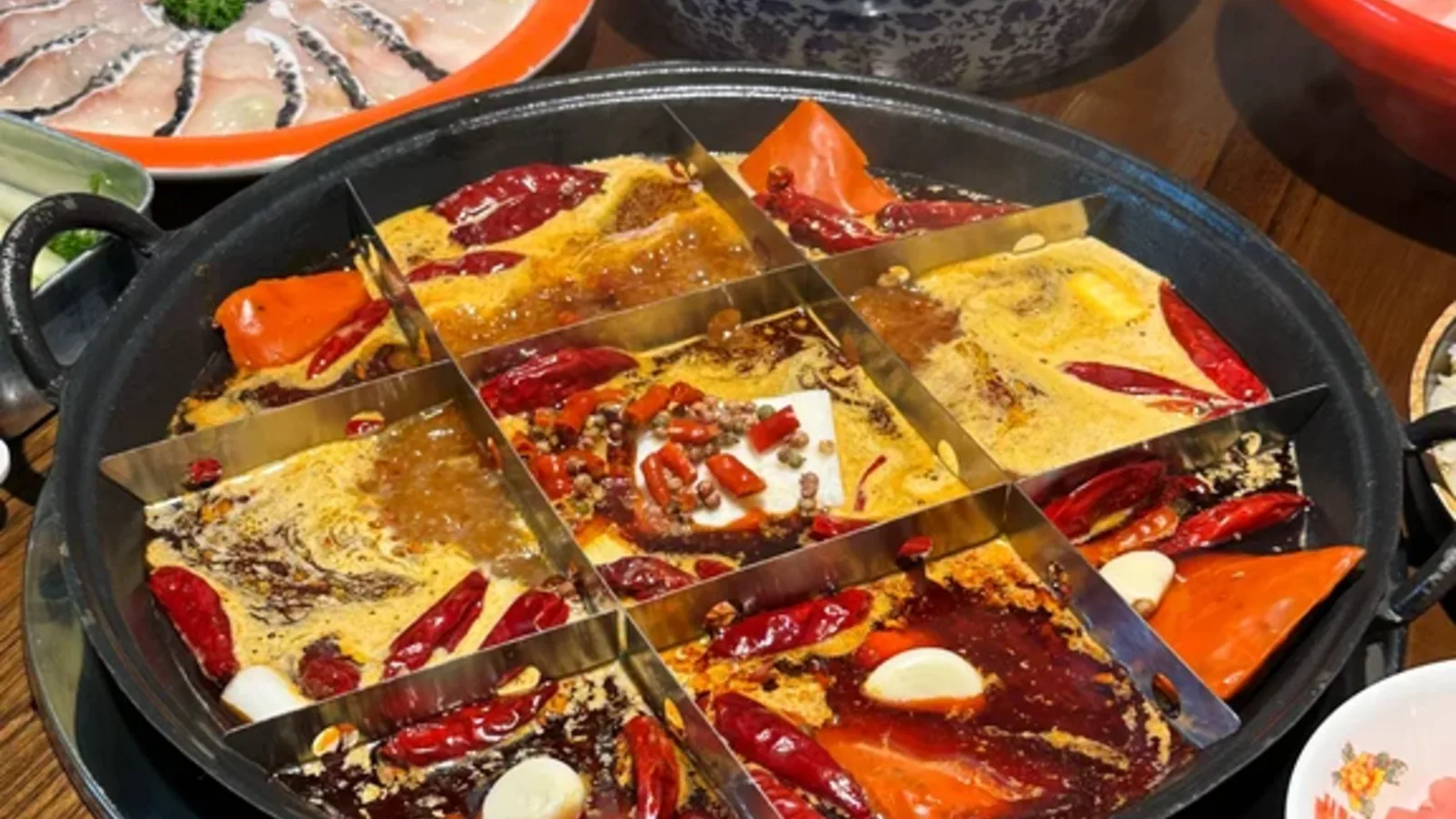 Chongqing hotpot with spicy broth and shared dishes